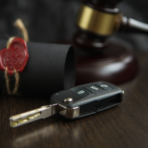 Gavel and car keys symbolizing vehicle-related charges